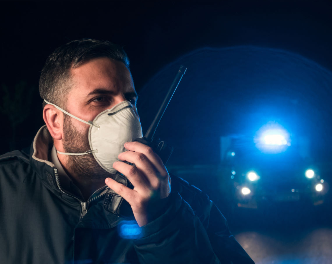 First Responder using walkie talkie
