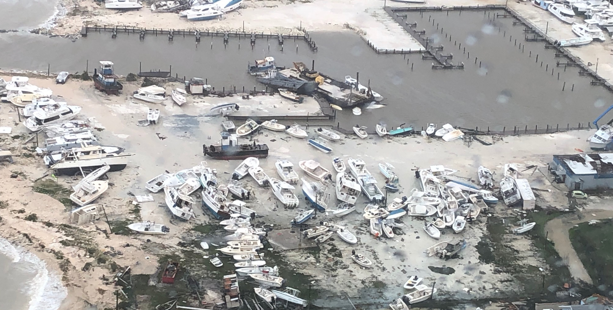Boats left on a beach after a storm
