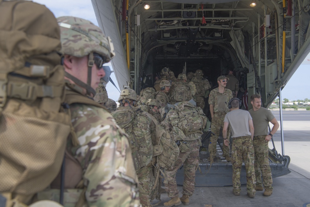 US Forces loading into a cargo plane. Photo by Senior Airman Daniel Hernandez