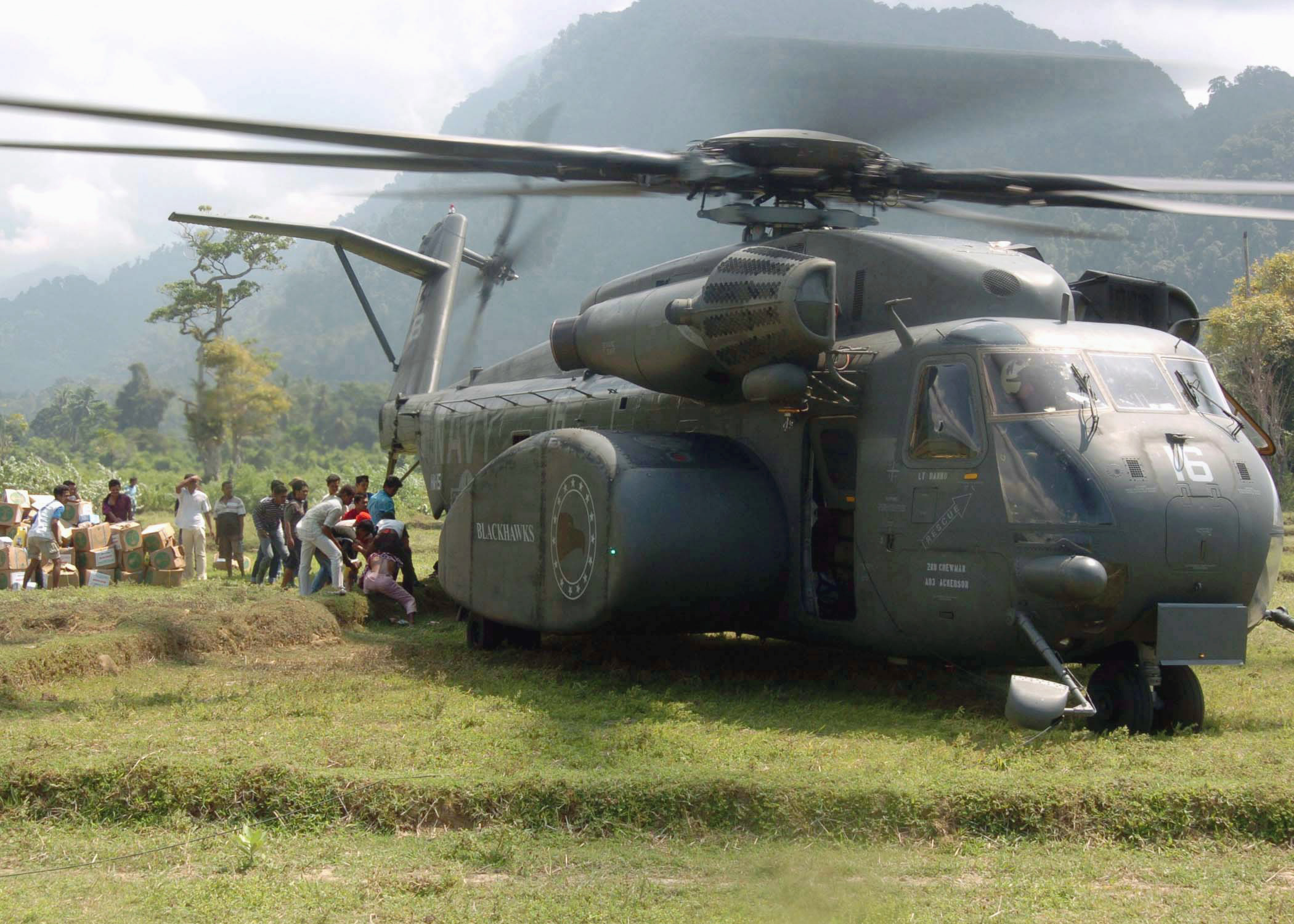Helicopter delivering aid