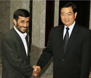 Iranian and Chinese official shaking hands