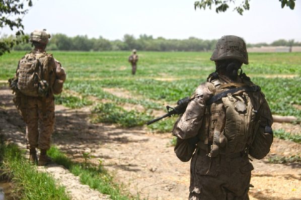 Female Engagement Team (FET) 13 in Sangin, Helmand Province, patrols through a cornfield with Marines