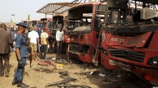 A man inspecting a bus