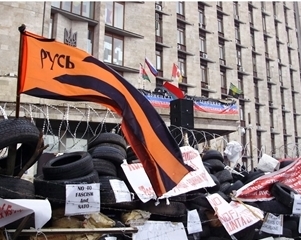  Flags and banners in front of captured Donetsk RSA on April 13, 2014. All flags with mourning ribbons.