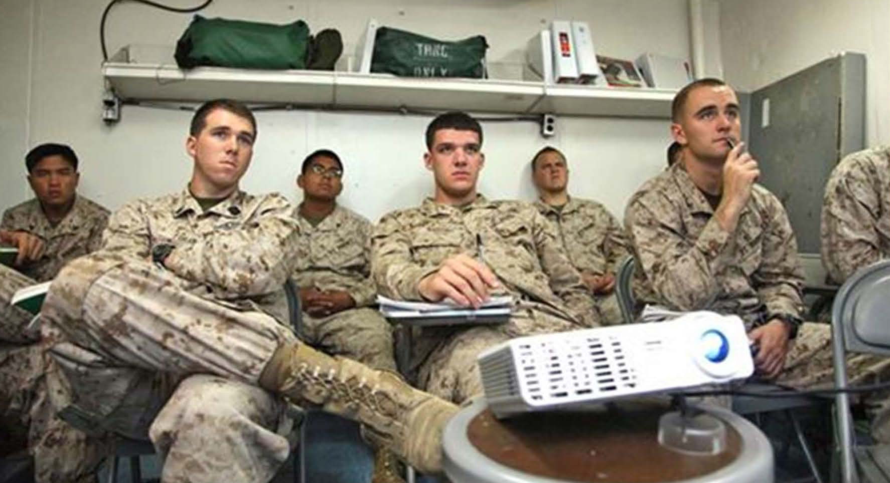 Marines assigned to the 15th Marine Expeditionary Unit (MEU) attend a U.S. History class aboard USS Rushmore, Dec. 28, 2012. Marines and Sailors aboard Rushmore use the Tuition Assistance Program to enroll in courses offered by Central Texas College and Park University. The 15th MEU was deployed as part of the Peleliu Amphibious Ready Group as a U.S. Central Command theater reserve force, providing support for maritime security operations and theater security cooperation efforts in the U.S. 5th Fleet area of responsibility.